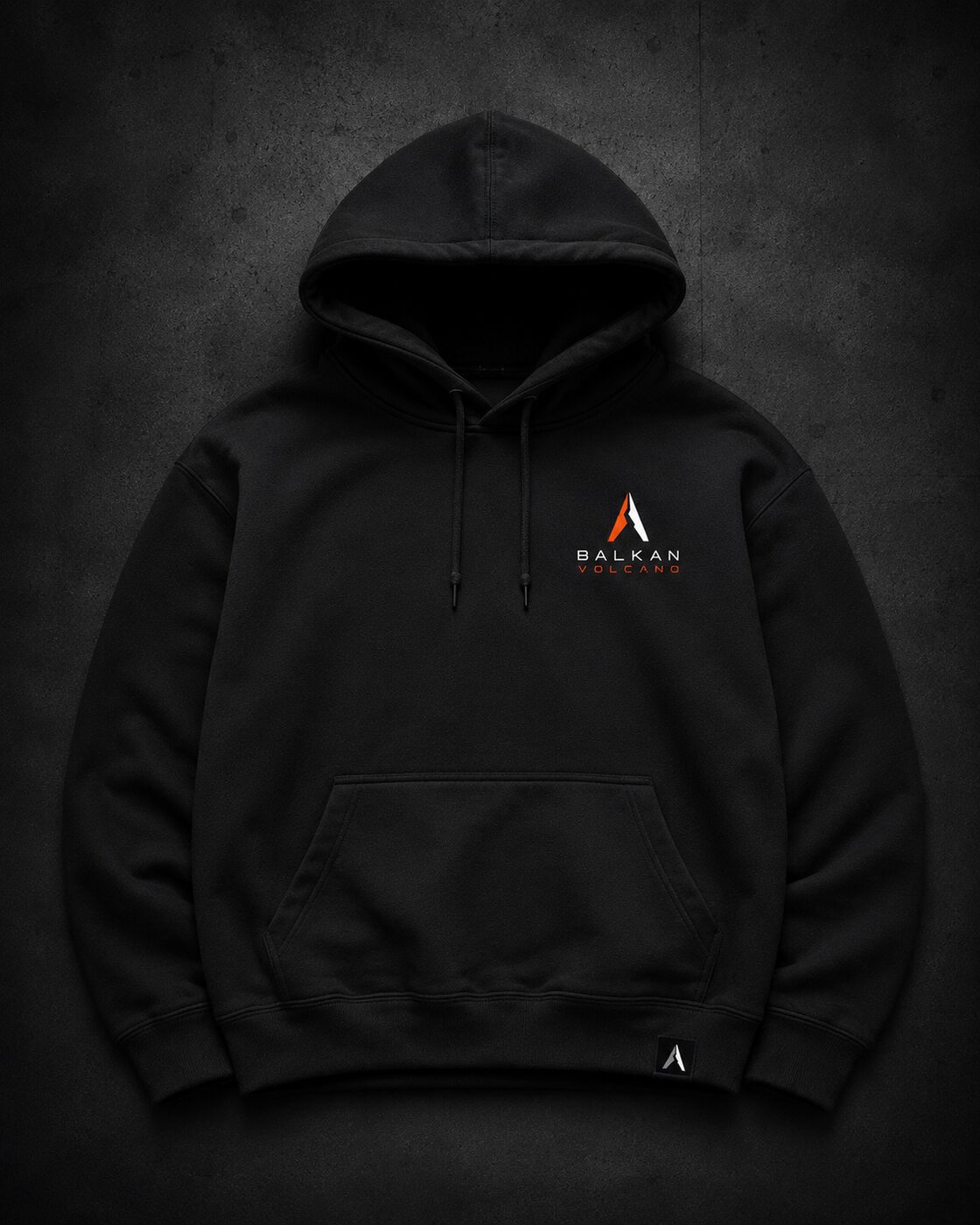 Basalt black hoodie with embroidered Balkan Volcano chest mark.