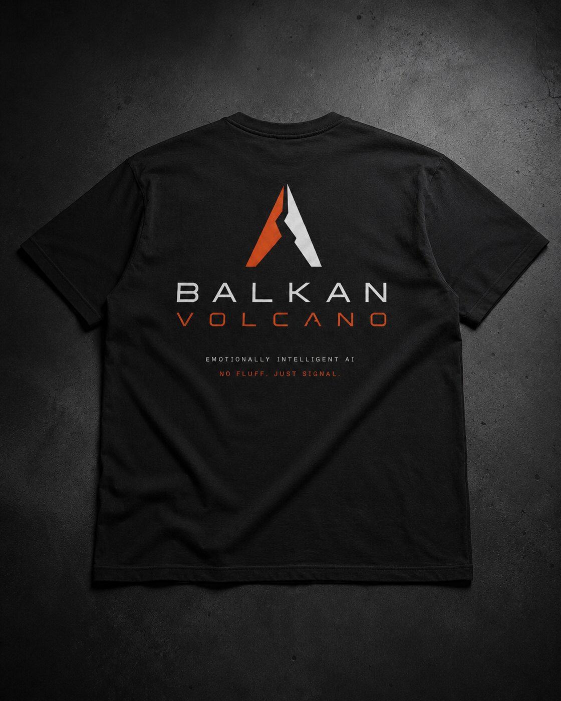 Obsidian heavyweight tee with the Balkan Volcano mark.